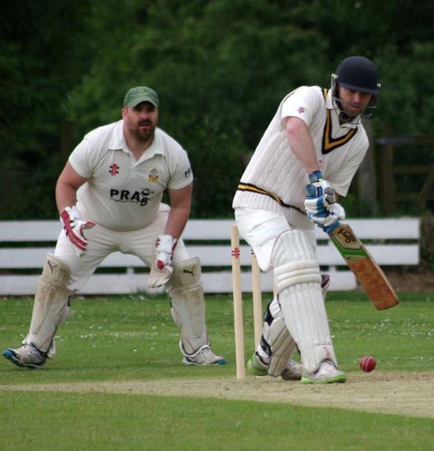 Opener Will Beresford guided Llangwm to victory with 69 not out